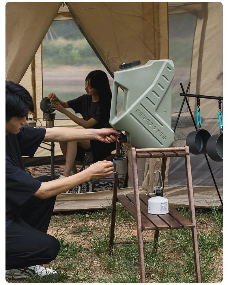 Green portable water storage tank in 13 litre or 18 litre size for camping and home use.