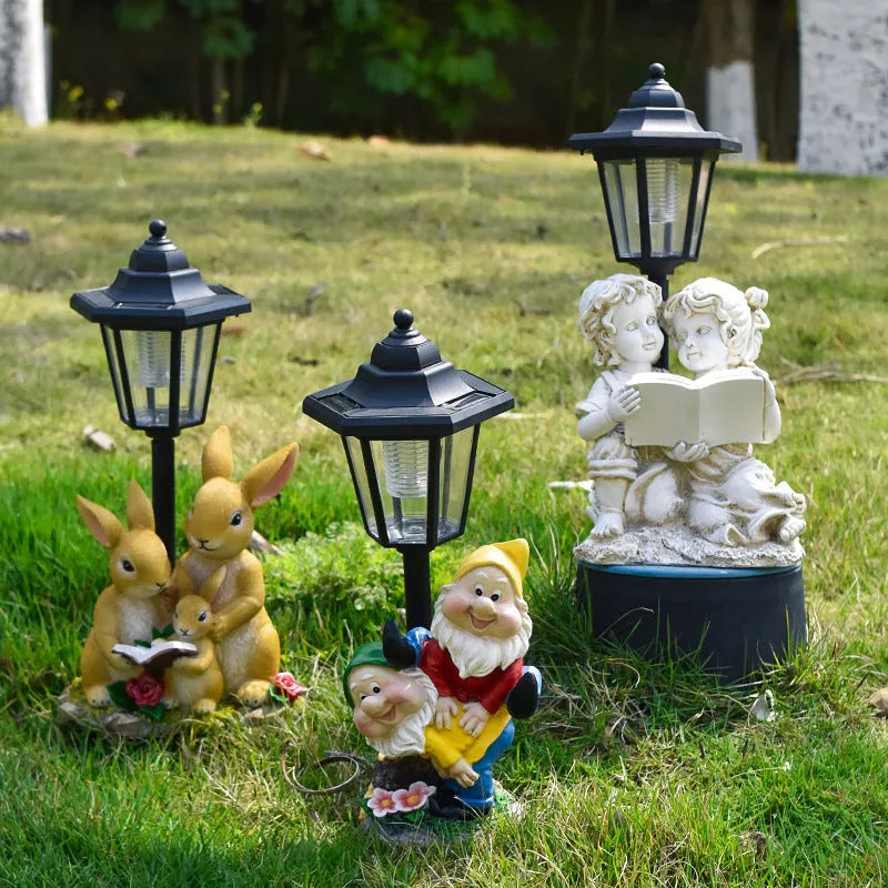 Hexagonal solar garden lamp with resin animal figure, 30cm tall with 24 LED lights for outdoor illumination
