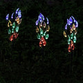 Set of three solar-powered leaf-shaped branch lights for garden decoration, 73cm long.