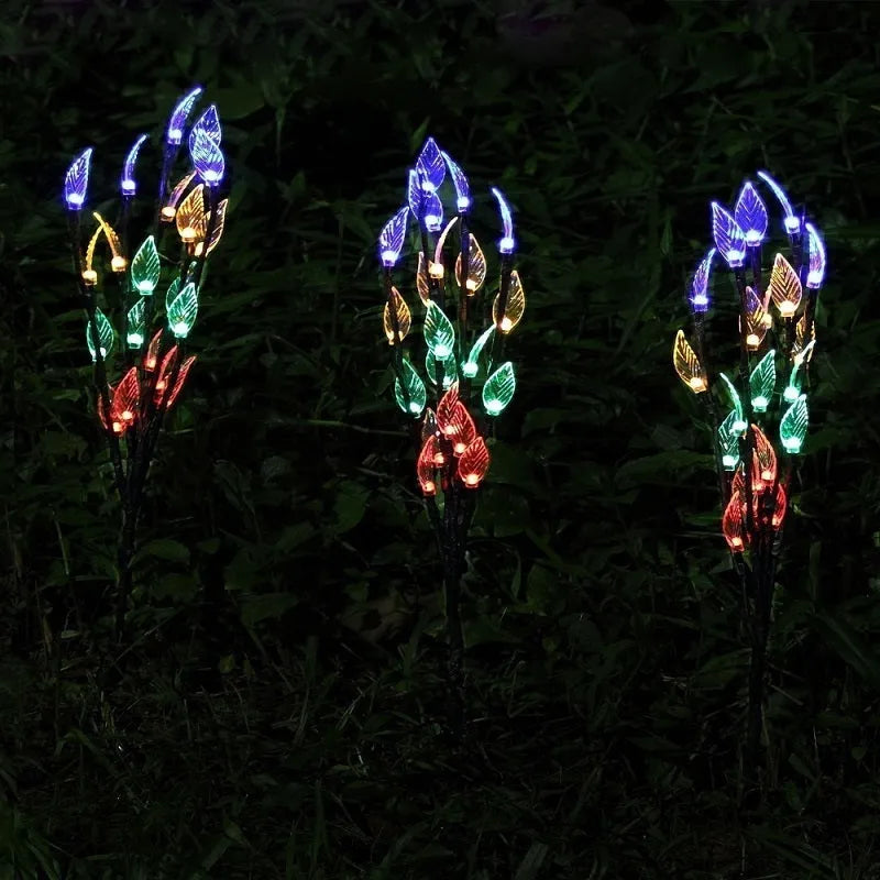 Set of three solar-powered leaf-shaped branch lights for garden decoration, 73cm long.