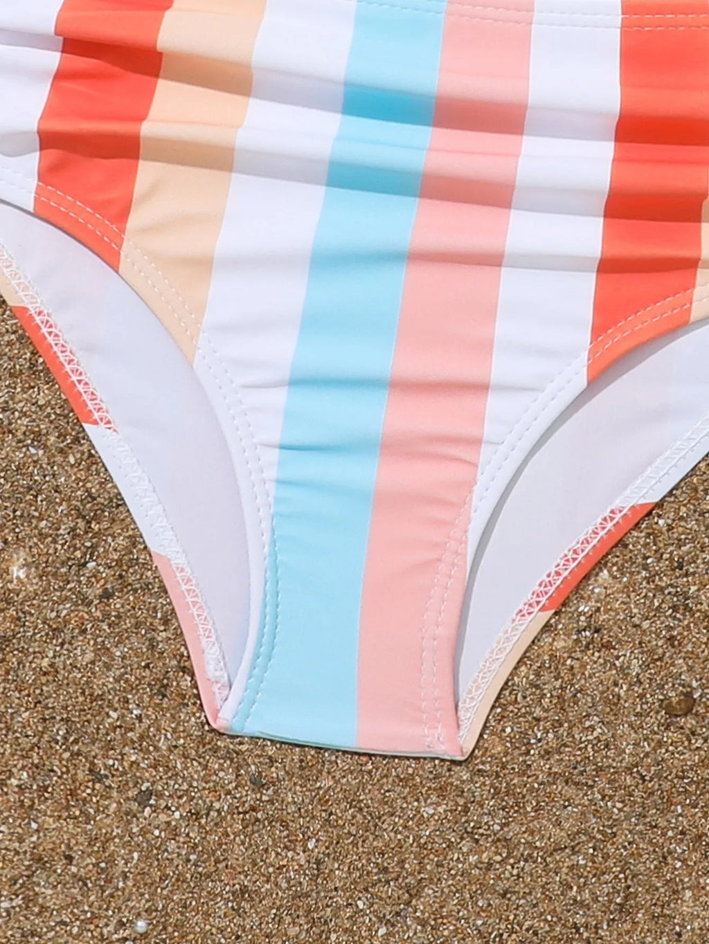 Girls plaid print swimsuit briefs with bra top, shown in multiple toddler and child sizes.