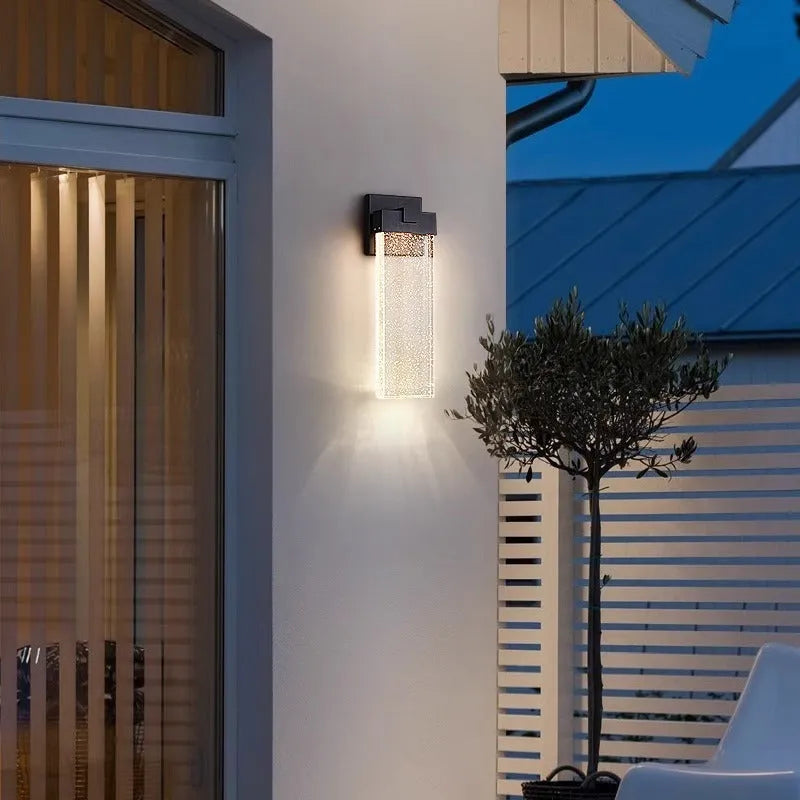 Black stainless steel outdoor LED wall lamp showing two size options for courtyard and corridor mounting