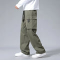 Boys' straight leg cargo trousers in army green with large cargo pockets and a drawstring waistband.