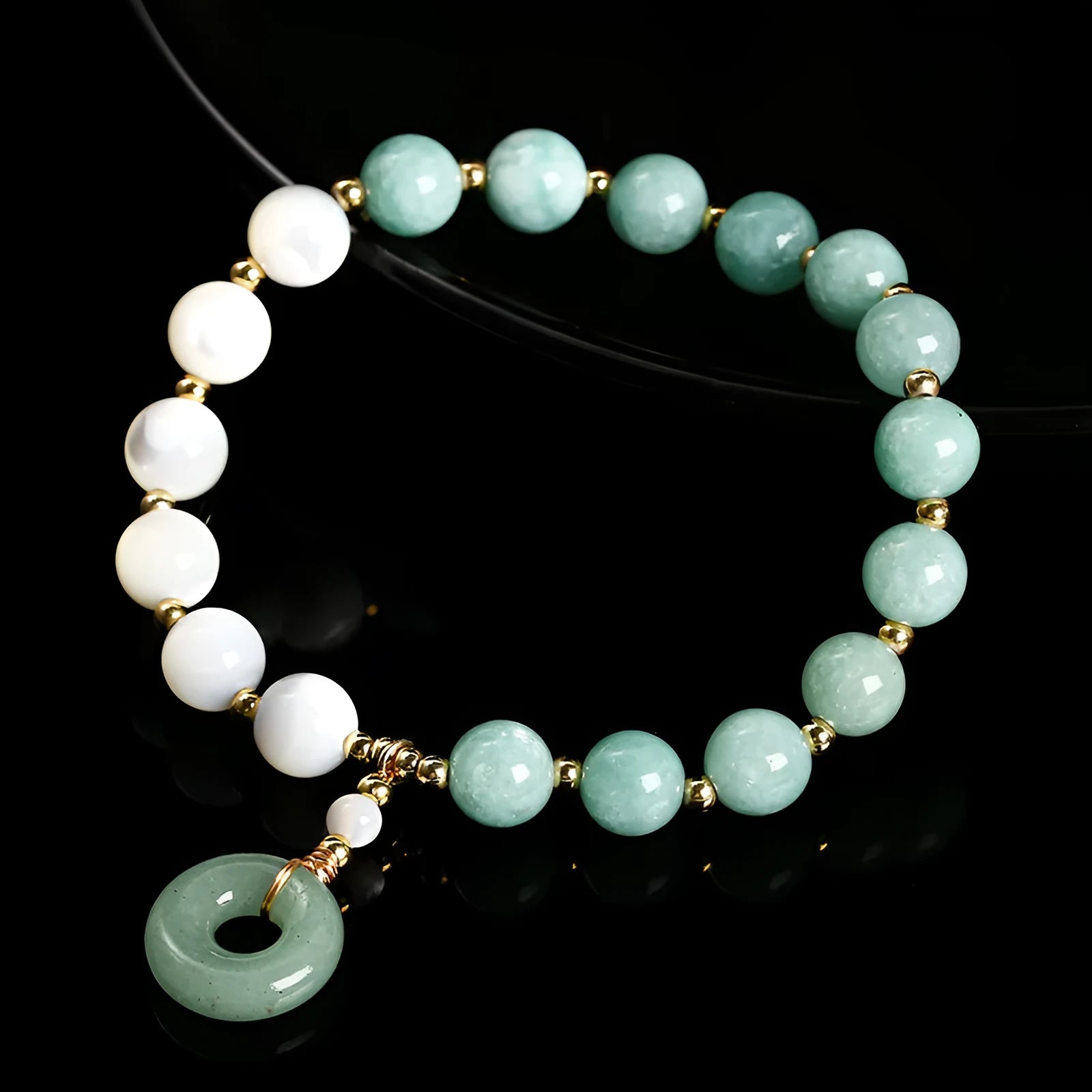 Blue Burma jade bracelet with 8mm round beads and a silver safety buckle clasp.