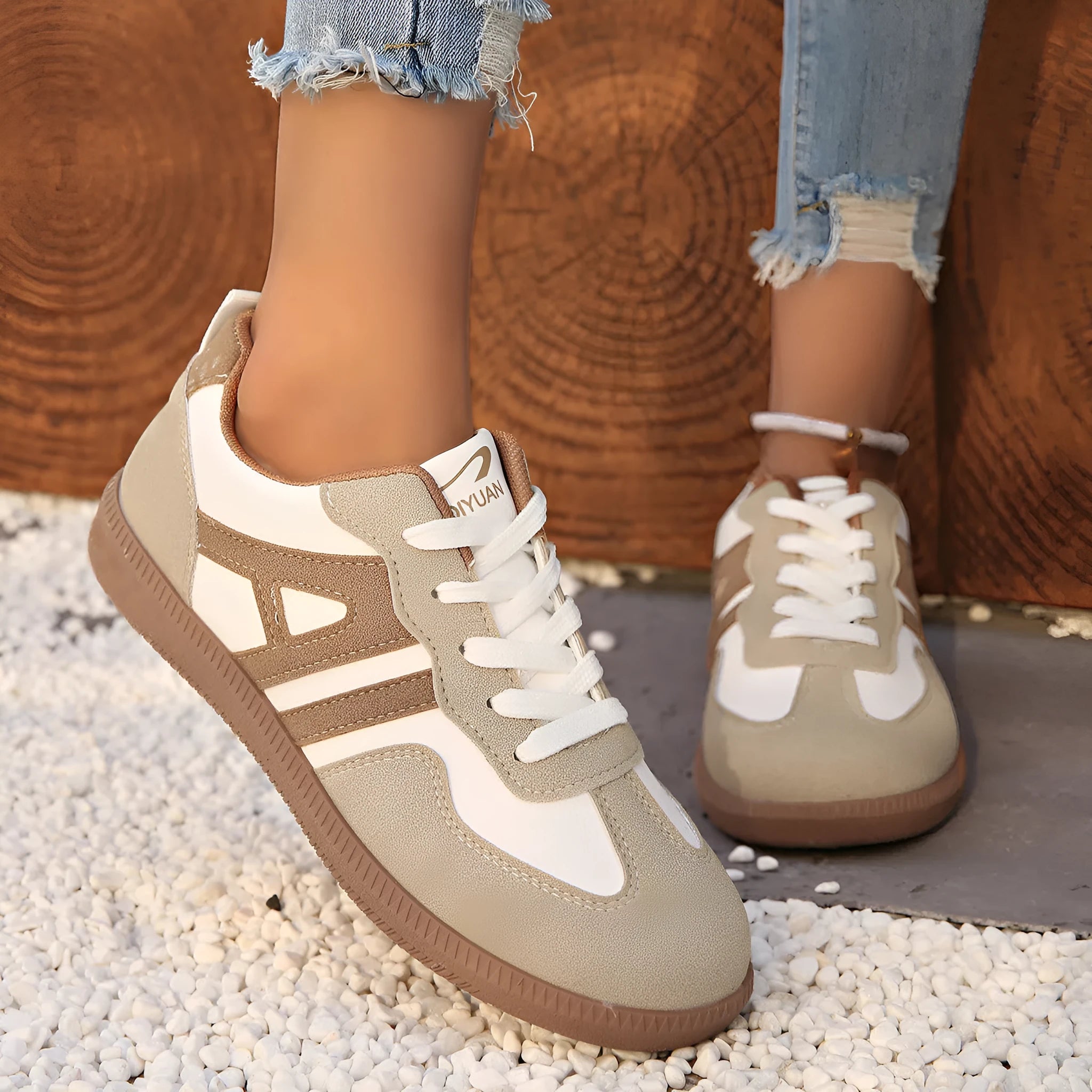 Women's retro colour matching lace-up casual trainers with a low platform heel in black, grey, or khaki.