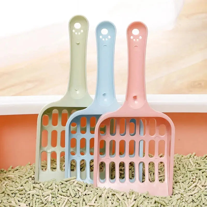 Blue plastic cat litter scoop showing 20cm length and 9cm width dimensions for cleaning litter trays