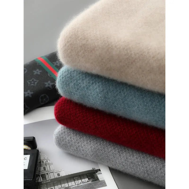 Sheep wool sweater with half-height zip and round neck in slim fit, showing standard wool yarn texture