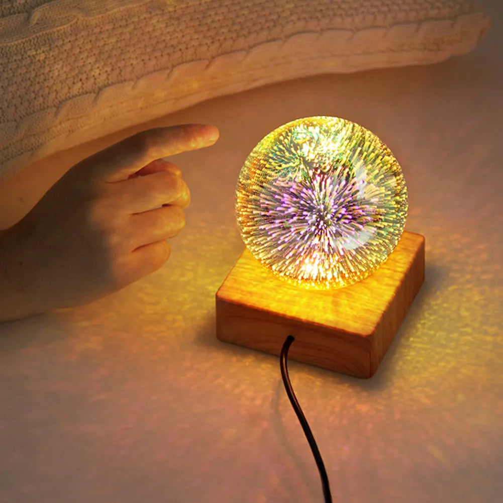 Spherical crystal ball night light with USB plug showing starry sky pattern illumination