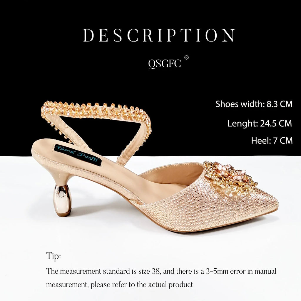 Women's black high-heel shoes with decorative ankle chain featuring floral rhinestone accents and matching clutch bag