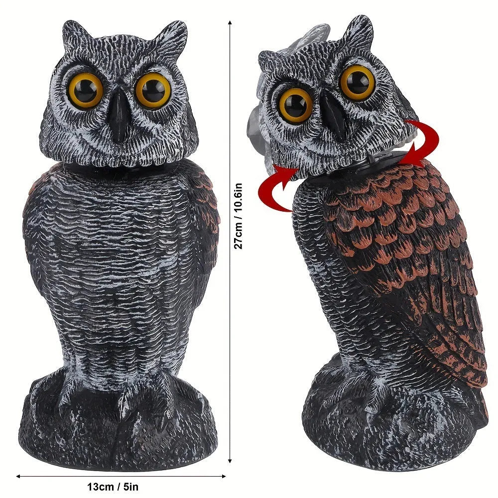 Artificial owl bait ornament with shaking head design for bird deterrent in garden setting