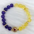 Handmade women's crystal bracelet with yellow and purple amethyst stones, manual craftsmanship