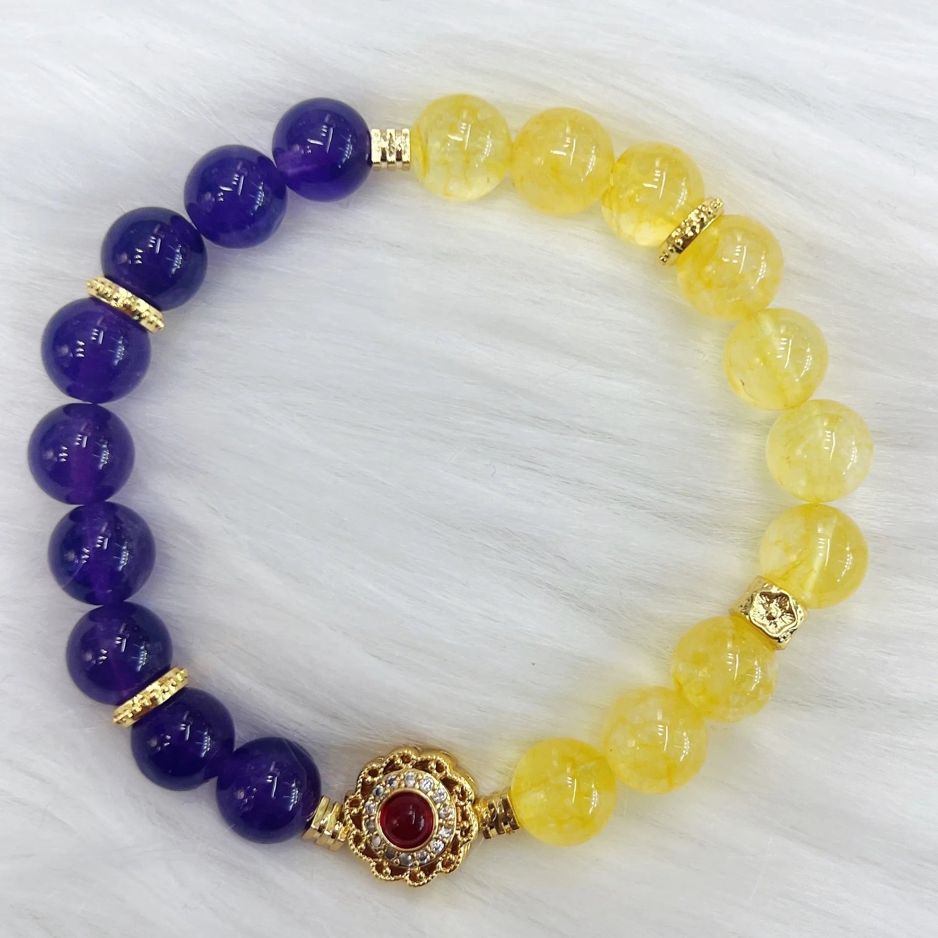Handmade women's crystal bracelet with yellow and purple amethyst stones, manual craftsmanship
