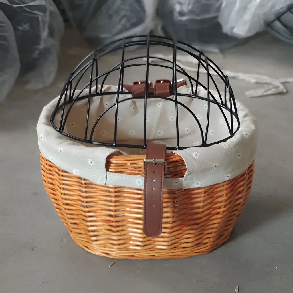 Honey colour wicker bicycle front handle basket, medium size, used as a pet seat for a cat or dog on a road bike