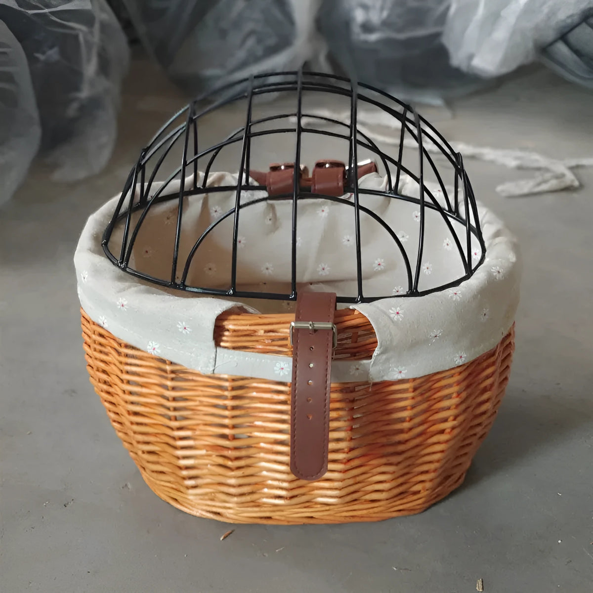 Honey colour wicker bicycle front handle basket, medium size, used as a pet seat for a cat or dog on a road bike