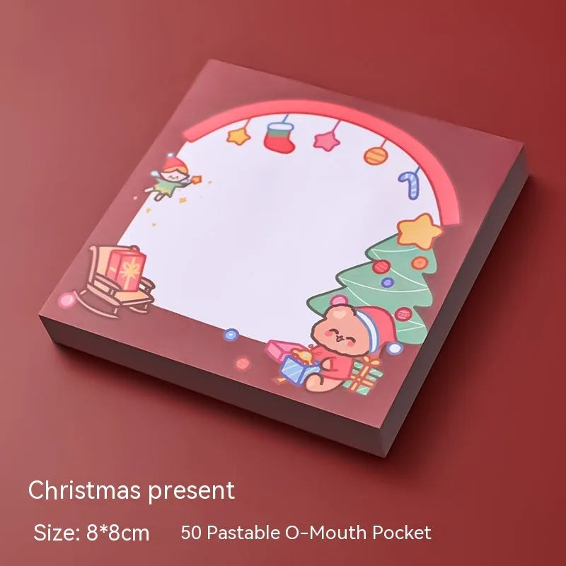 Christmas sticky notes book with eight festive designs including Santa bear elf gift house sled snowman crystal ball