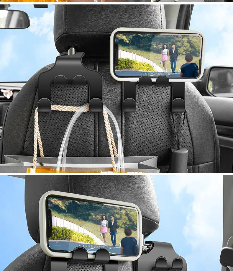 Two white ABS plastic car multifunction holder hooks mounted on a car dashboard.