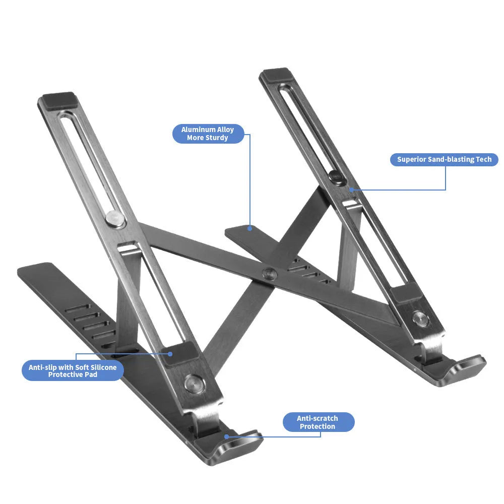 Silver aluminium laptop stand with six-height adjustment gears beside a black laptop on a desk