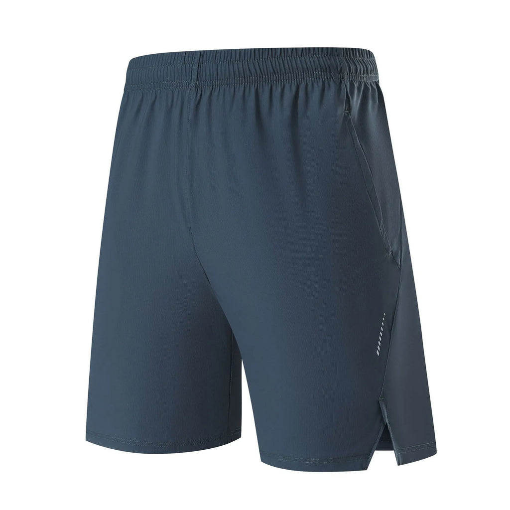 Man wearing black ice silk sports shorts, showing mid-waist fit and shorts length.