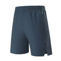 Man wearing black ice silk sports shorts, showing mid-waist fit and shorts length.