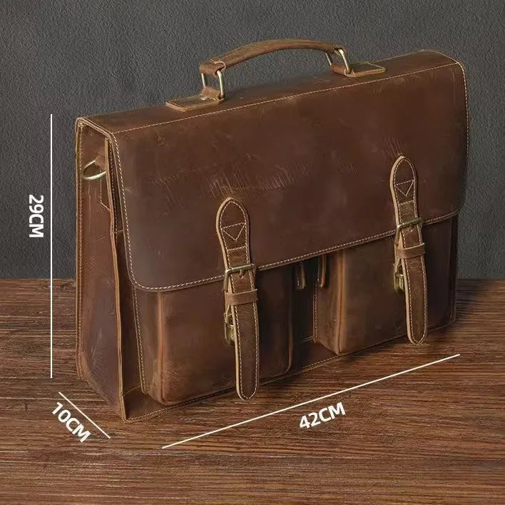 Dark brown cowhide leather computer bag with crossbody strap and anti-theft features
