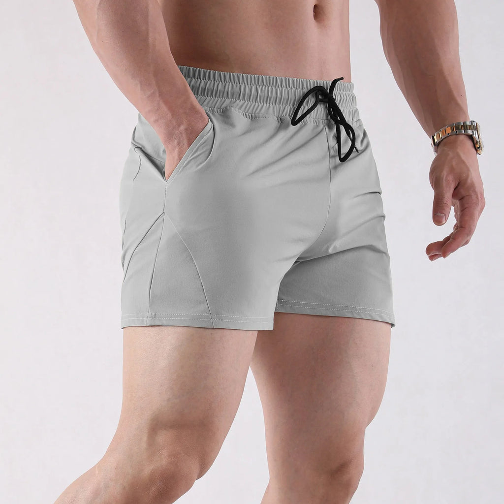Men's basketball shorts in grey, black, apricot, or green, made from medium-elastic polyester for summer sports