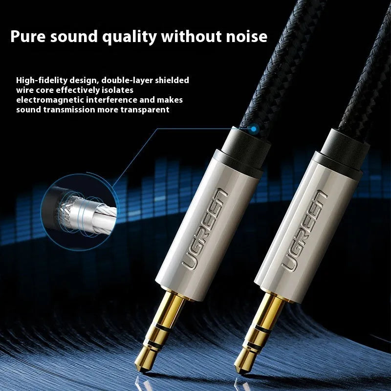 3.5mm aux audio cable with silver-plated connectors and black woven mesh outer cover, coiled and ready for use