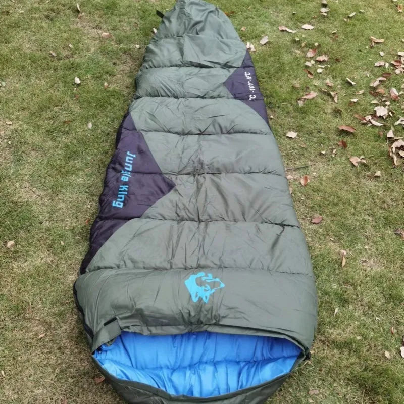 Cotton sleeping bag in army green, dimensions 230cm x 80cm x 50cm, compressed in 38cm x 26cm bag for outdoor camping