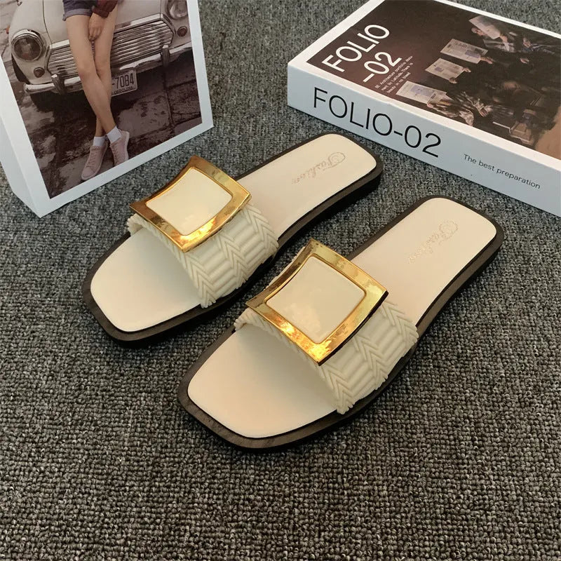Women's flat summer slippers in apricot colour with a casual design and PVC sole.