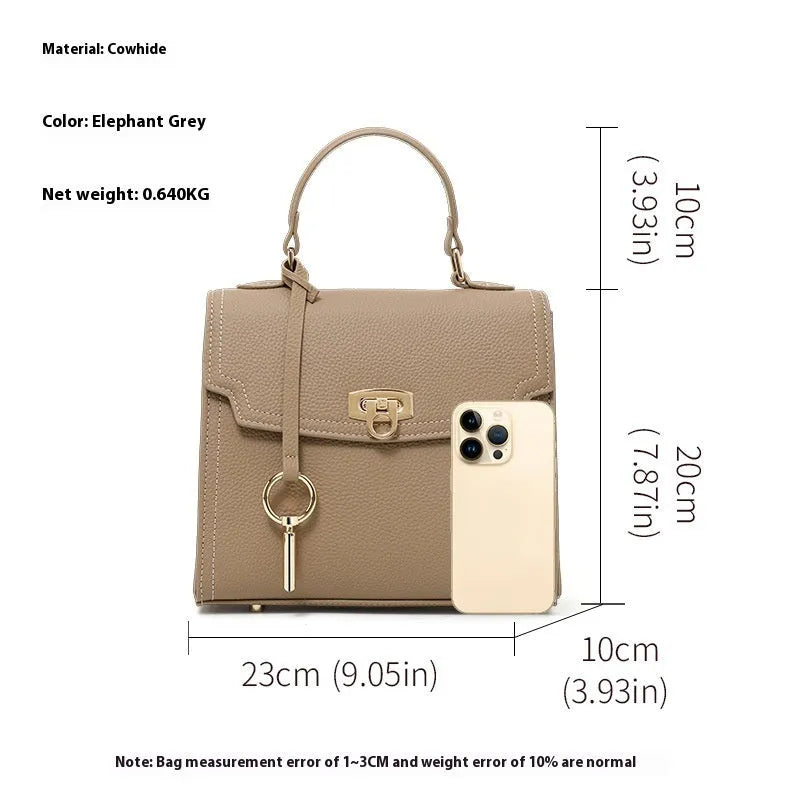 Elephant grey genuine leather crossbody handbag with litchi pattern, secure lock, and double shoulder straps