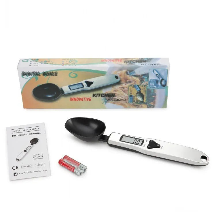 Digital measuring spoon with LCD display showing weight measurement