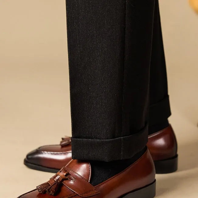 British-style tassel loafers in polished leather with rubber sole and pigskin lining