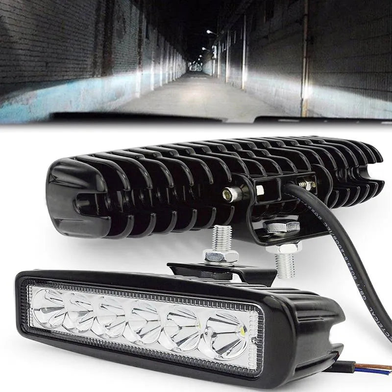 Black car auxiliary light with die-cast aluminium housing and polycarbonate cover showing six LED configuration