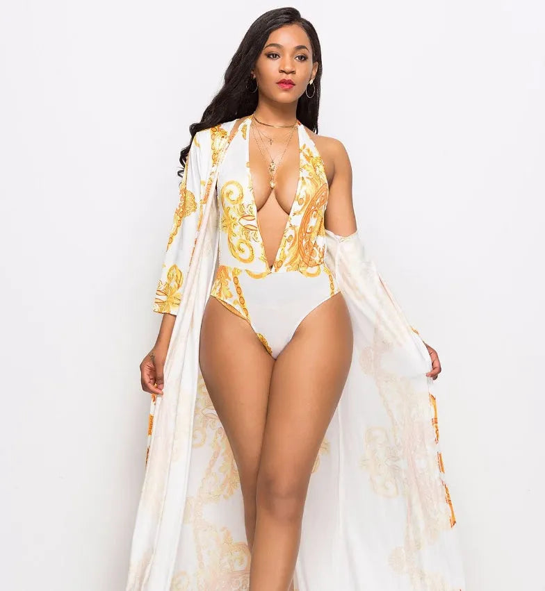 Printed cloak bikini in polyester, available in black or white, sizes M to 2XL