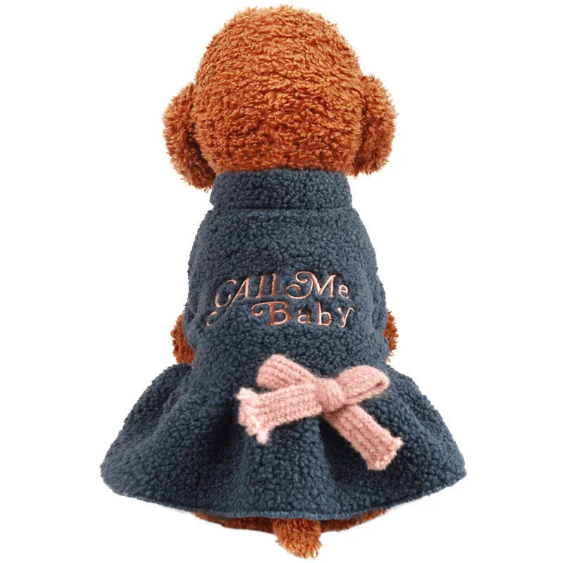 Pink fleece pet skirt with baby letter print for a small dog, showing size XS.