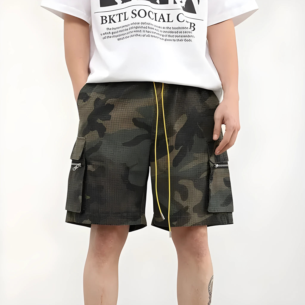 Men's camouflage multi-pocket work shorts showing cropped length and pocket details
