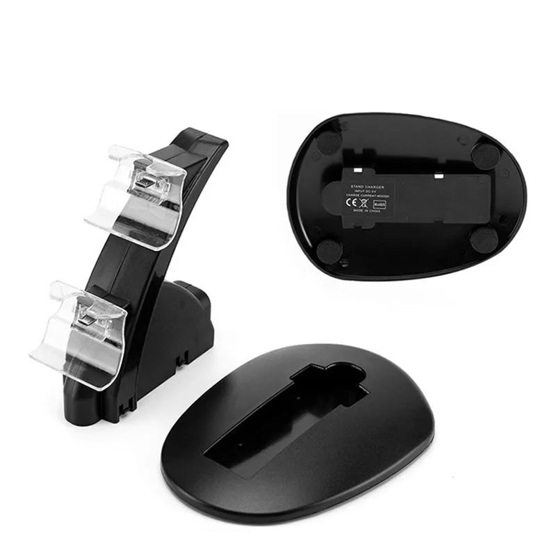 Black dual charging stand holding two Xbox One gamepad controllers.