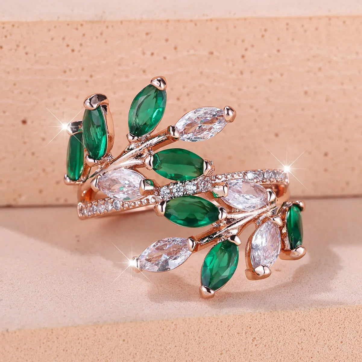 Adjustable copper leaf ring with horse eye zircon stones in multiple colour options showing botanical design