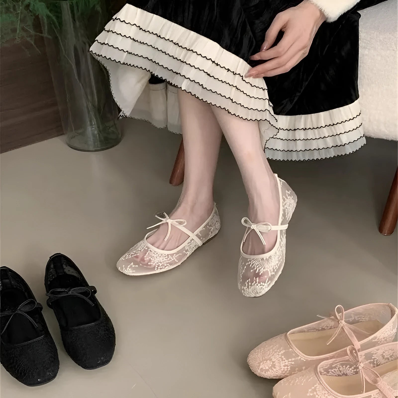 Women's flat lace mesh Mary Jane shoes in pink with a mid heel and buckle strap.