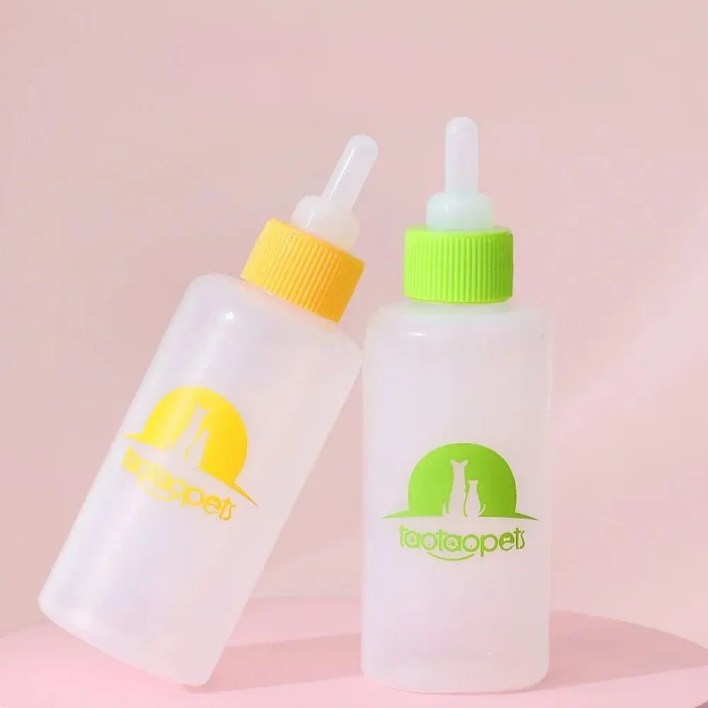 Four coloured pet milk bottle feeders with cleaning brush for newborn puppies and kittens