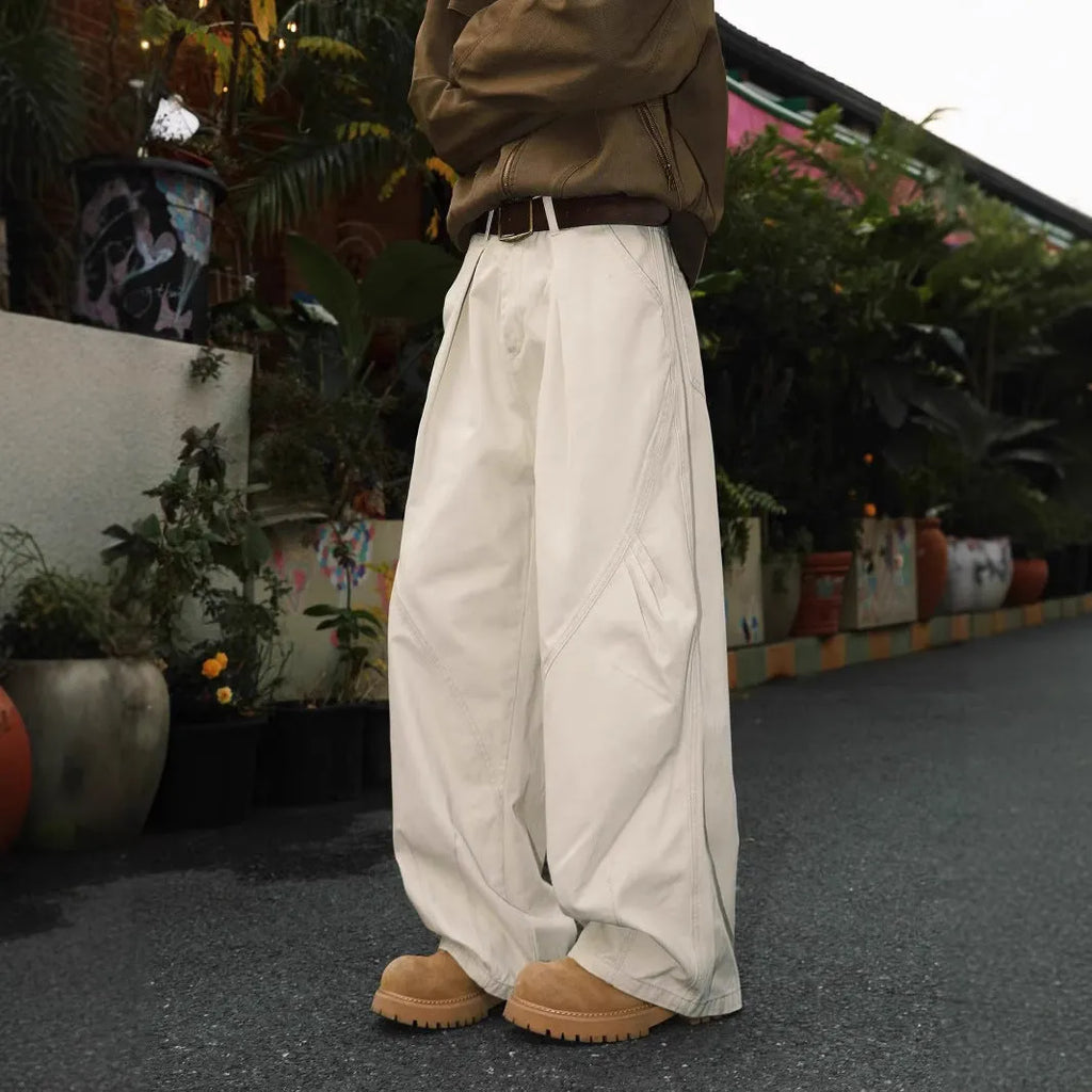 Men's pleated straight-leg trousers in striped pattern with micro-elasticity, available in apricot, black, and brown colours.