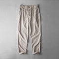 Men's linen casual trousers in navy blue, apricot, or grey with mid waist design