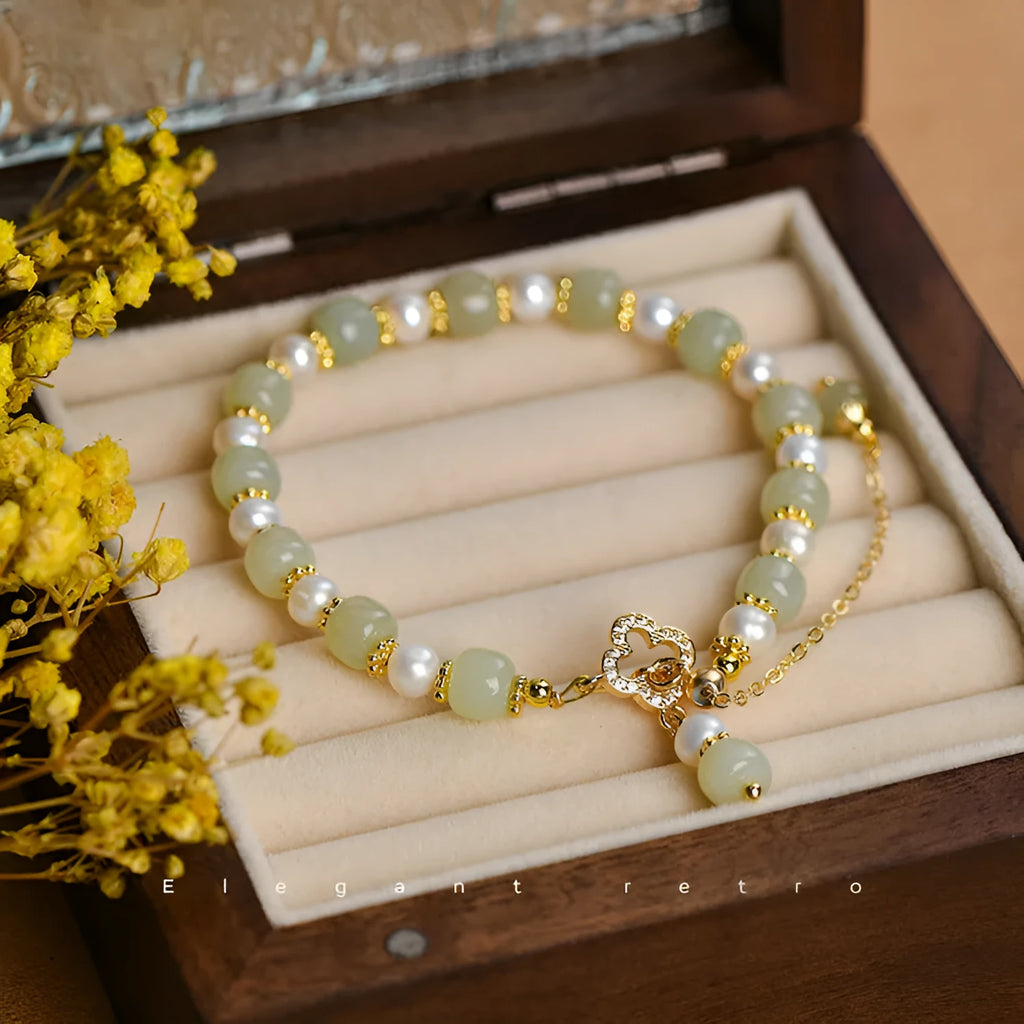 Women's Hetian jade bracelet with round pearl pendant in gold electroplated finish