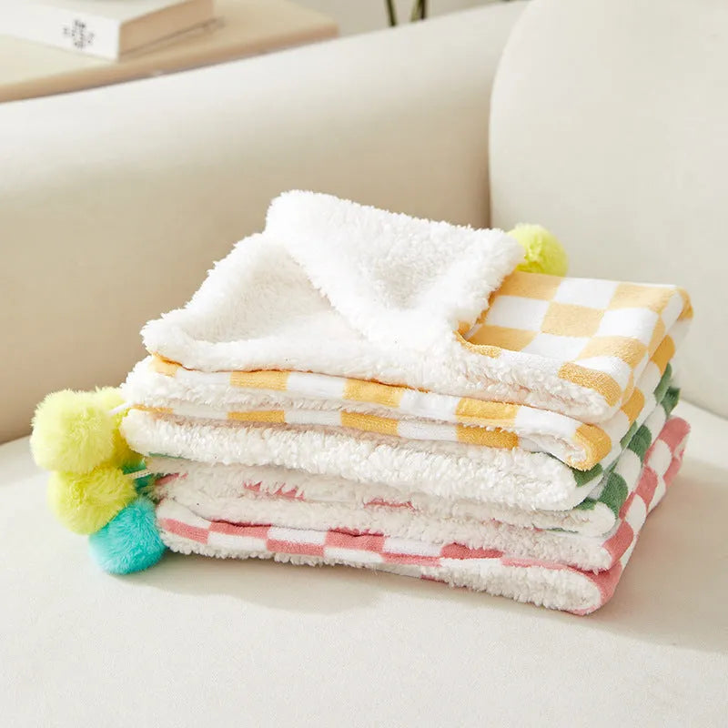 Green plaid pattern soft fleece pet blanket with fur ball decoration for cats and dogs
