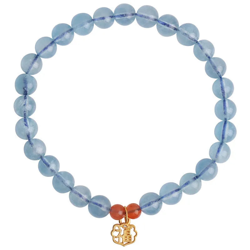 Ice transparent aquamarine crystal bead bracelet with 8mm round beads and sequin detailing