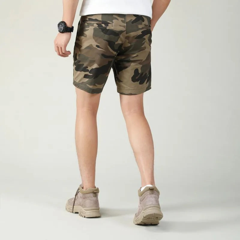 Cotton workwear shorts in camouflage pattern with mid-waist and zip fly design