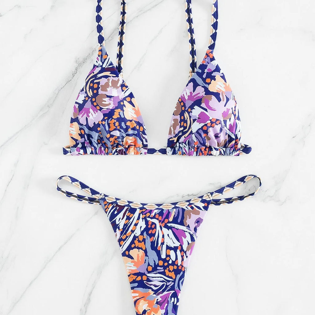 Women's floral print triangle bikini with tie-back and split-front polyester briefs.