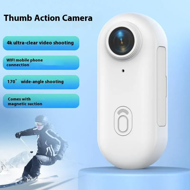 Small black 4K action camera with magnetic mount attached to a bicycle helmet.