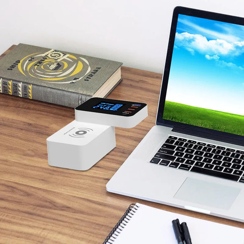 White multi-port USB charger with wireless charging pad and EU UK US plug adaptors