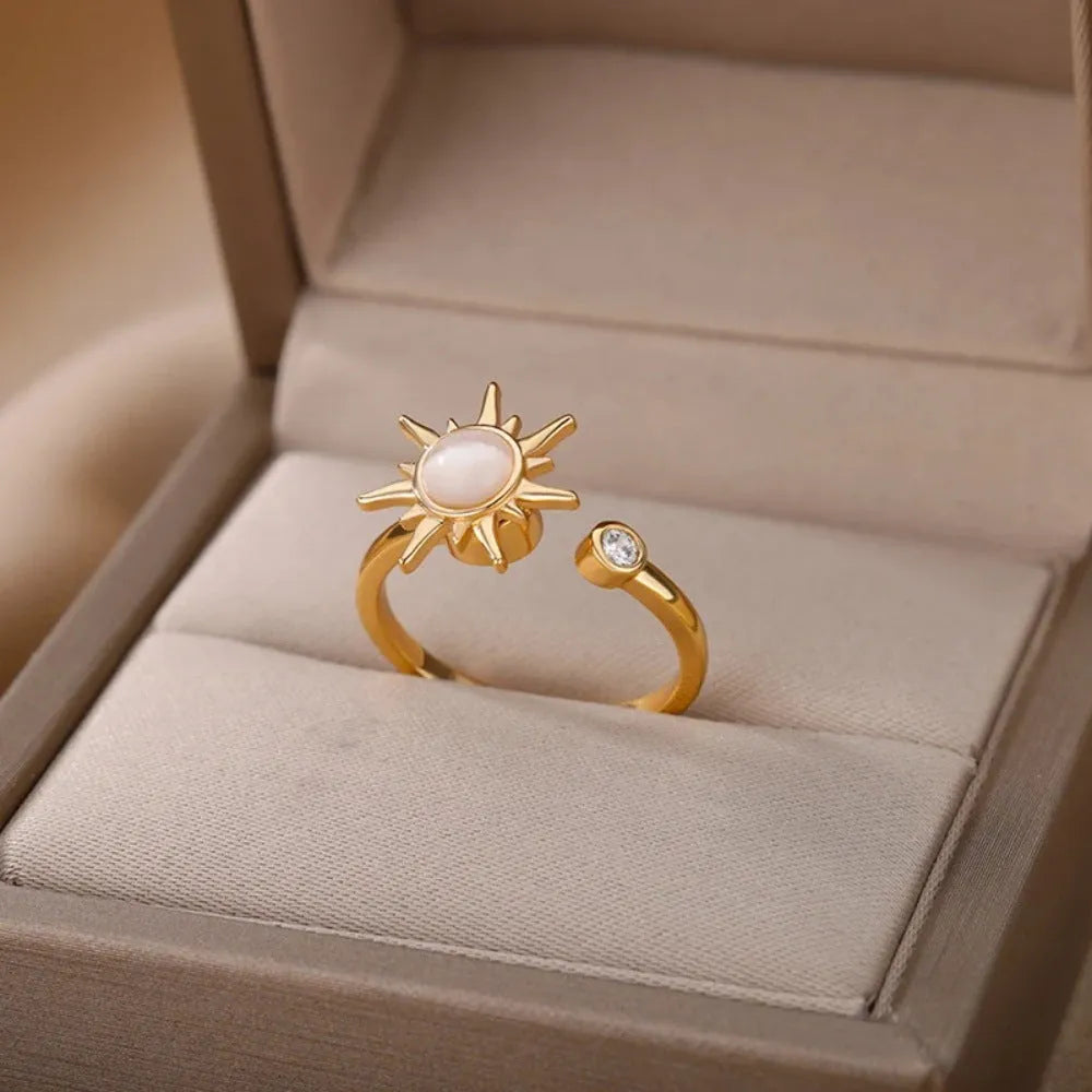 Simple geometric gold adjustable fidget ring with rotating band on a finger
