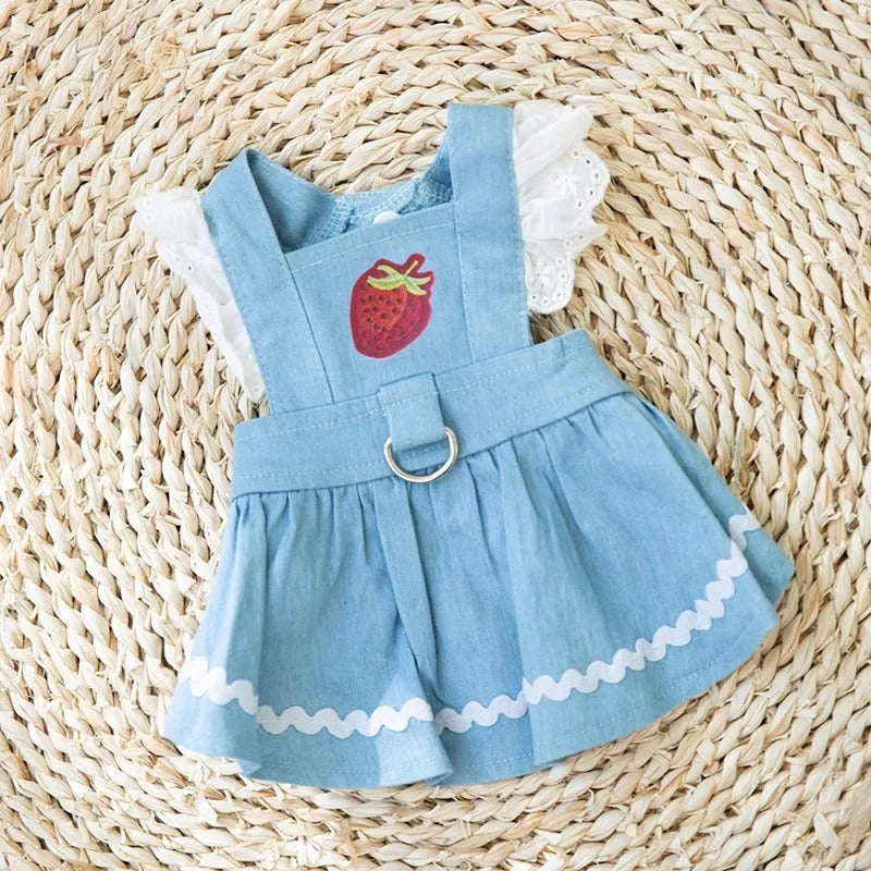 Bondi blue denim skirt for dogs with a strawberry print, shown on a small dog.